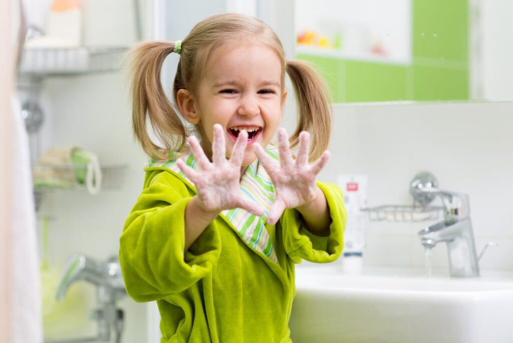 Little girl showing hands