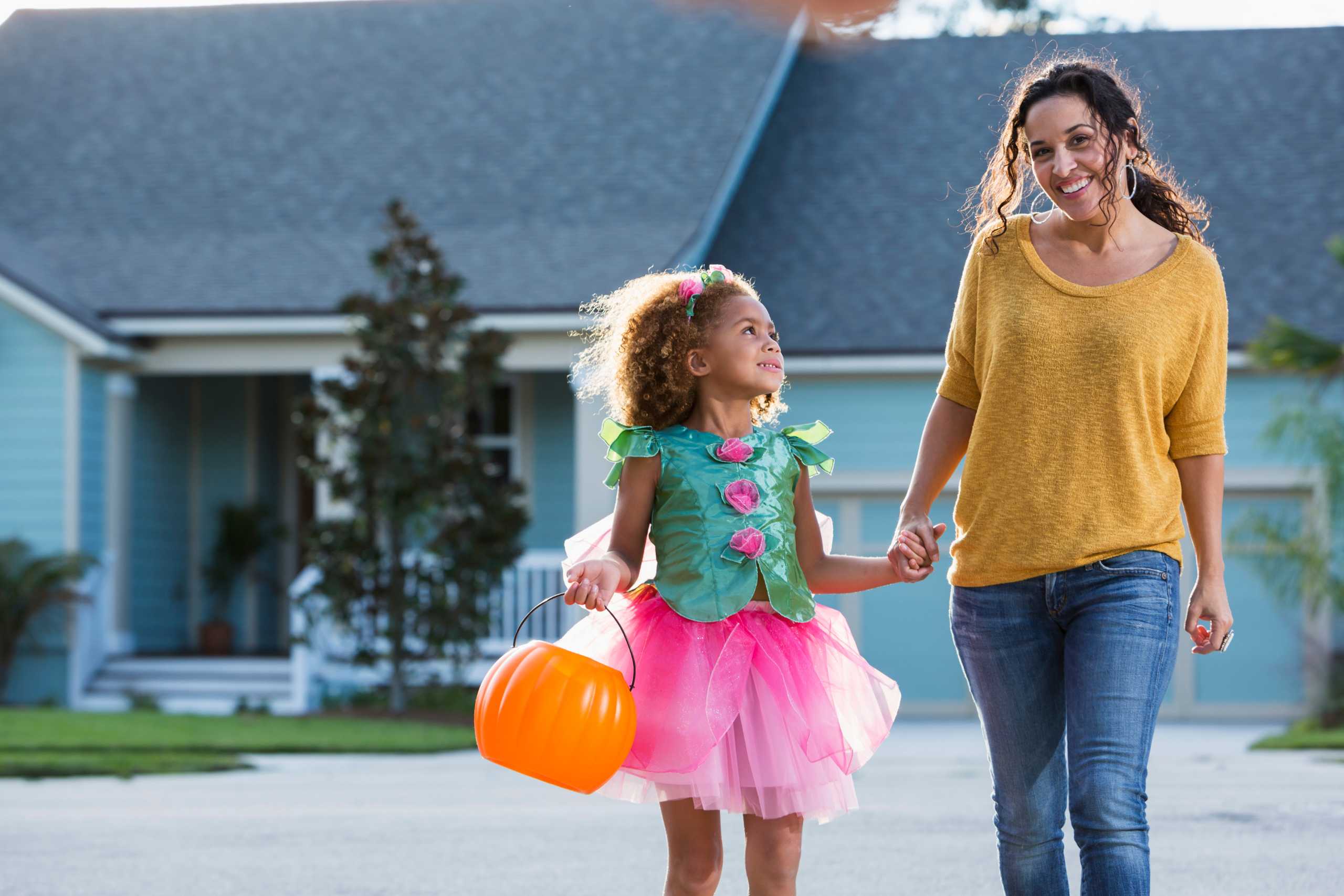 Mother and daughter trick or treating