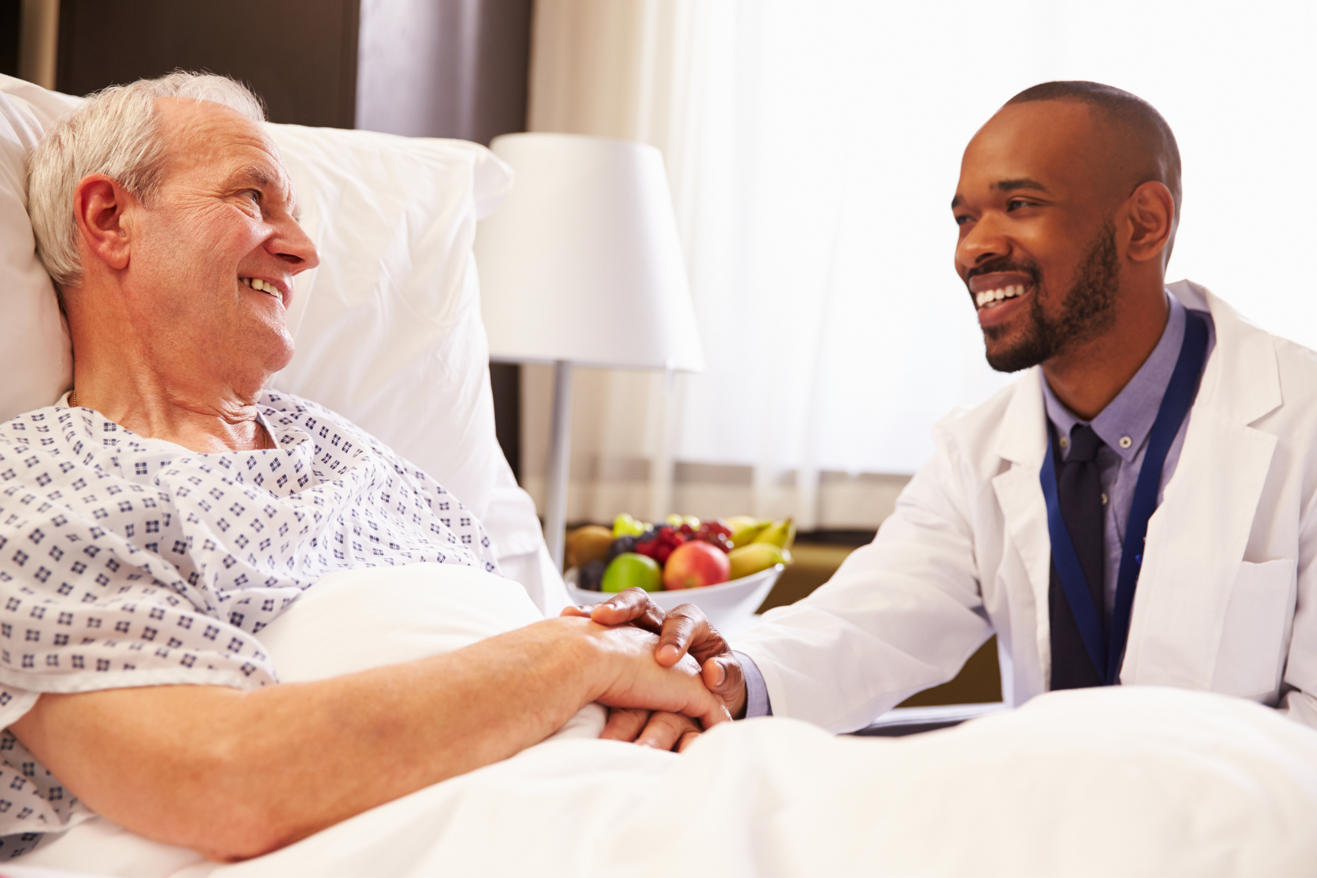 Doctor speaking with flu patient